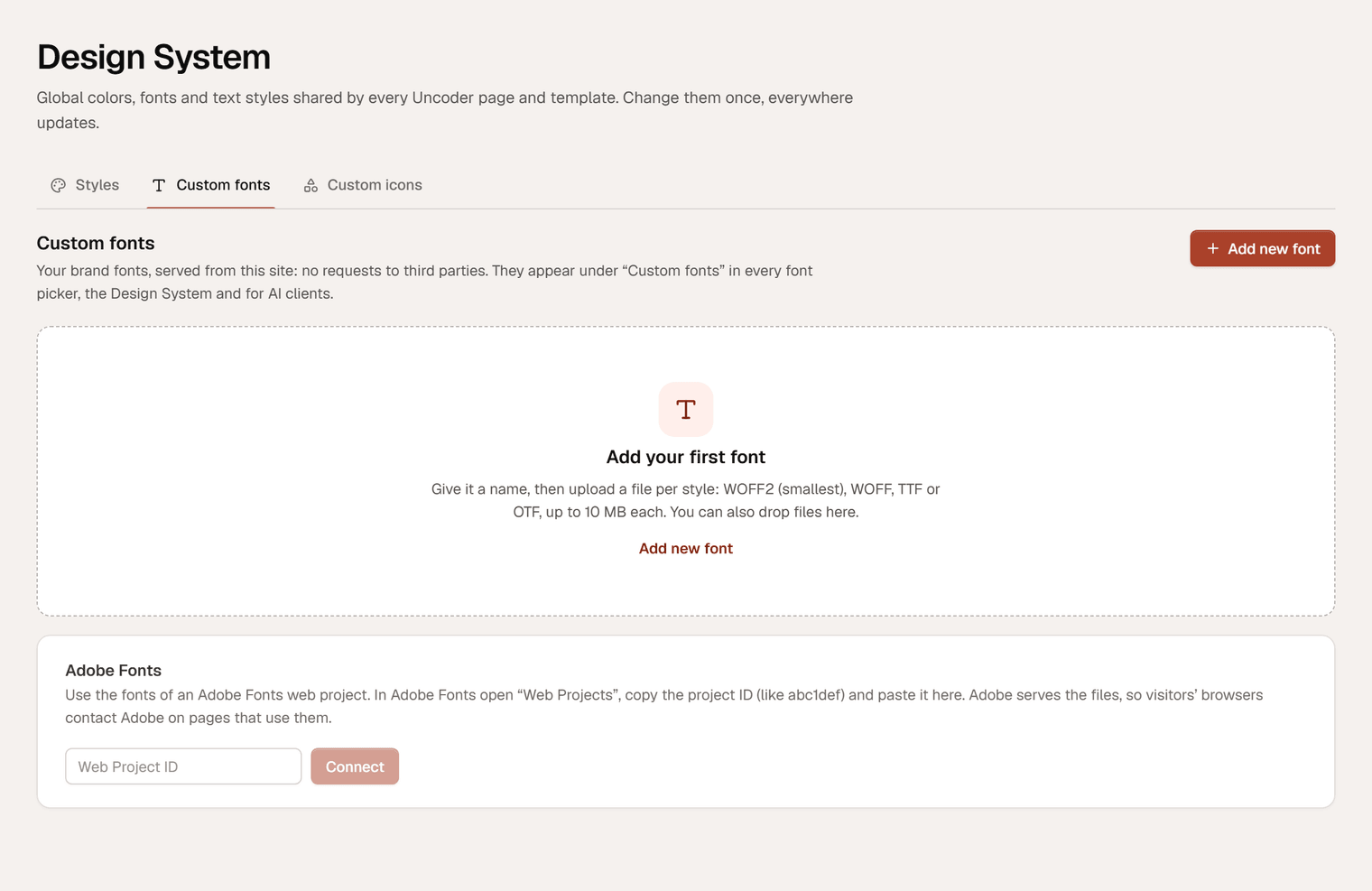 The Custom fonts tab of the Design System screen with the Add your first font area and the Adobe Fonts card