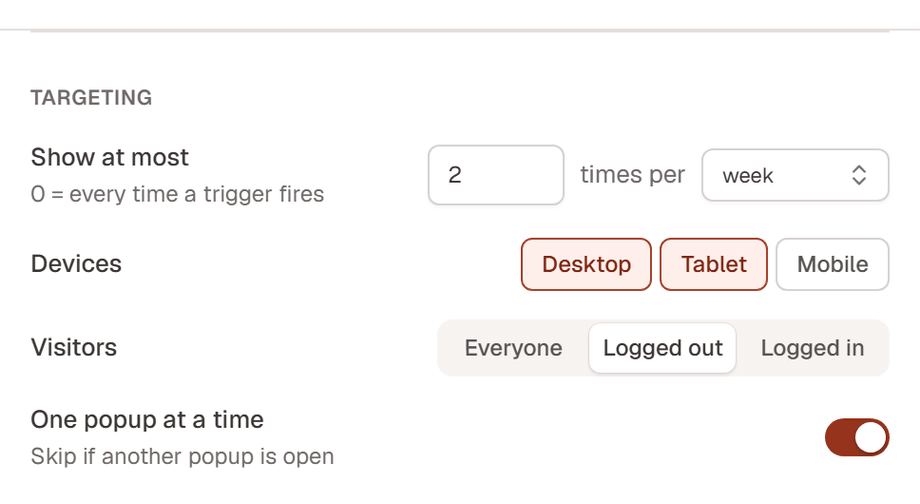The Targeting group of the Popup settings drawer: Show at most 2 times per week, Desktop and Tablet selected, Visitors set to Logged out, and One popup at a time on